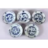 A SET OF 5 CHINESE BLUE & WHITE PORCELAIN SAUCER DISHES, with blue central decoration depicting