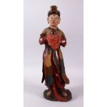 A CHINESE WOOD & LACQUER FIGURE, the figure stood holding a vessel, 43cm high