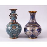 TWO CHINESE CLOISONNE VASES, the first with a white / beige ground with decoration of dragons and