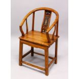 A CHINESE CARVED WOOD HOOP BACK ARM CHAIR, the back panel carved with a figure and openwork with
