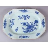 AN 18TH CENTURY CHINESE BLUE & WHITE PORCELAIN SERVING DISH, with floral decoration, 34cm x 24cm.
