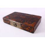 A GOOD CHINESE LACQUER LIDDED BOX - with raised decoration depicting native figural landscape