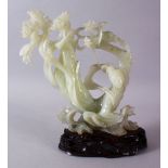 A CHINESE CARVED JADE FIGURE OF A GODDESS / GUANYIN, in an unusual curvature pose with native