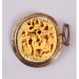 A CHINESE CANTON CARVED IVORY BROOCH, mounted in gold coloured metal ( possibly gold ), carved