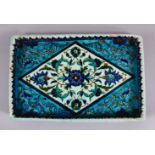 A 19TH CENTURY OTTOMAN TURKISH KUTAHYA POTTERY TRAY, decorated in iznik style with floral motif