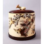 A JAPANESE MEIJI PERIOD CARVED IVORY & SHIBAYAMA TUSK POT, the body inlaid with semi precious shells