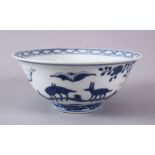 A CHINESE MING BLUE & WHITE PORCELAIN BOWL, decorated with landscape scenes with animals, the base