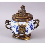 A CHINESE BLUE & WHITE JAR & COVER, with metal mounts and cover, the body with figures, birds and