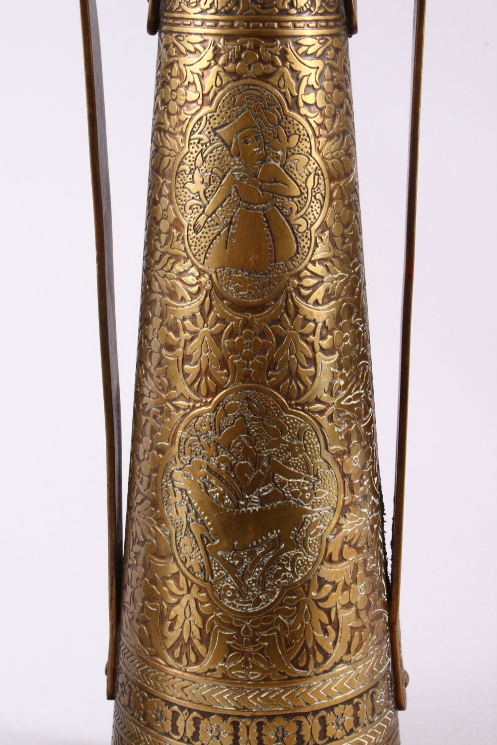 A PAIR OF PERSIAN BRASS ENGRAVED VASES, with twin handles, carved panels of figures and foliage, - Image 3 of 11
