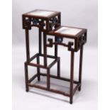 A CHINESE ROSEWOOD TWO TIER STAND, the tops inset with hardstone, the sides inset with cloisonne