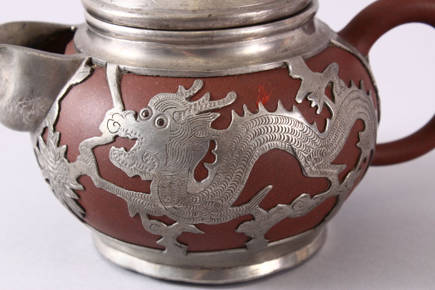 A CHINESE YIXING CLAY & WHITE METAL DRAGON TEAPOT, The body of the teapot encapsulated with a carved - Image 5 of 9