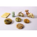 A MIXED LOT OF 8 CHINESE CARVED JADE PENDANTS / FIGURES, An erotic plaque, a monkey, three disks two