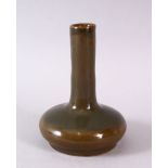 A CHINESE TEA DUST GLAZE PORCELAIN VASE, the body with a graduated tea dust glaze, base with an