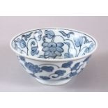 A 20TH CENTURY JAPANESE BLUE AND WHITE BOWL, with floral decoration, 15cm diameter.