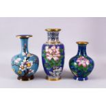 A MIXED LOT OF THREE CHINESE CLOISONNE VASES, each with a varying shade of blue grounds, each