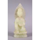 A CHINESE CARVED HARDSTONE FIGURE OF SEATED GUANYIN / DEITY, in a seated pose once holding a ruyi
