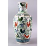 A CHINESE VASE painted with chickens, six character mark to base, 43cm high.
