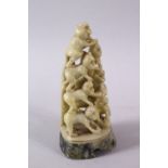 A CHINESE CARVED SOAPSTONE FIGURE OF MONKEYS, the carving depicting ten monkeys climbing, 11cm