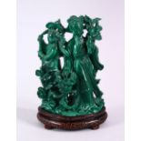 A CHINESE CARVED MALACHITE FIGURE OF TWO FEMALES, both carved stood in traditional gowns holding