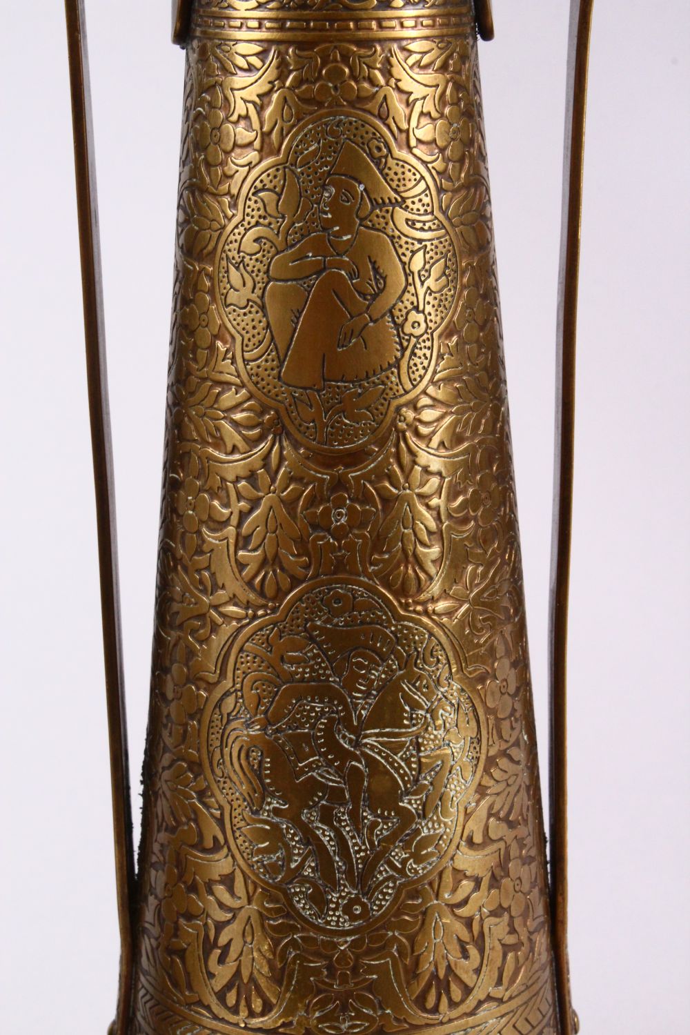 A PAIR OF PERSIAN BRASS ENGRAVED VASES, with twin handles, carved panels of figures and foliage, - Image 7 of 11