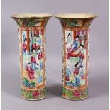 A PAIR OF CHINESE CANTON FAMMILE ROSE PORCELAIN SLEEVE VASES, with panel decoration of figures