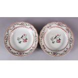 A PAIR OF OF 18TH CENTURY CHINESE EXPORT FAMILLE ROSE DISHES, the centre with a bird and floral