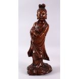 A CHINESE CARVED WOODEN FIGURE OF GUANYIN, 37cm high