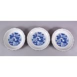 THREE JAPANESE BLUE & WHITE FUKAGAWA PORCELAIN PLATES, each with central floral underglaze blue