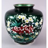 A JAPANESE TAISHO / SHOWA PERIOD GREEN GINBARI CLOISONNE VASE, with a foil ground and blossom &