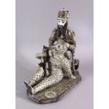 A RARE & UNUSUAL SIGNED 19TH CENTURY PERSIAN QAJAR GLAZED POTTERY FIGURE OF RUSTAN SLAYING THE WHITE