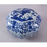 A CHINESE BLUE & WHITE OCTAGONAL PORCELAIN BOX & COVER - the cover with a garden scene with figures,