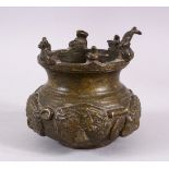 AN EARLY SOUTH INDIAN BRONZE BOWL, the bowl with animal decoration to the rim including snake & ram,