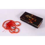 A SET OF CARVED CORAL RELIGEOUS PRAYER BEAD & INLAID IVORY TORTOISESHELL BOX, the red coral prayer