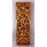 A LARGE 19TH CENTURY CHINESE GILTWOOD WALL PANEL, the panel carved with figures, animals, dragons