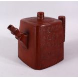 A CHINESE YIXING CLAY TEAPOT, of square / rectangular form, the body with carved calligraphy, the