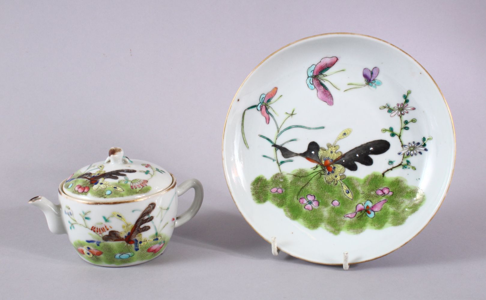 A CHINESE FAMILLE ROSE PORCELAIN TEAPOT, COVER & SAUCER DISH, each decorated in a similar way