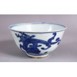 A CHINESE BLUE & WHITE PORCELAIN BOWL, with mythical beast decoration and a mar to base, 12cm