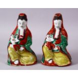 A PAIR OF 19TH CENTURY CHINESE FAMILLE VERTE POTTERY FIGURES OF GUANYIN, 15cm high.