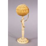 A FINE 18TH CENTURY SRI LANKAN CARVED IVORY BILBOQUET, overall height 14cm.