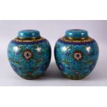 A PAIR OF 19TH / 20TH CENTURY CHINESE CLOISONNE GINGER JARS AND COVERS, the blue ground decorated