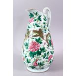 A LARGE CHINESE JUG, painted with dragon and flowers, 35cm high.