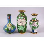 A MIXED LOT OF THREE CHINESE CLOISONNE VASES - the largest with a green ground with native Lotus