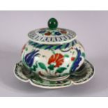 A 19TH CENTURY IZNIK STYTLE POTTERY CANTAGALLI LIDDED BOWL & DISH, decorated with floral motif