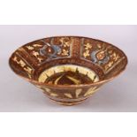 A GOOD IRAN STYLE POTTERY BOWL, decorated with blue & brown glaze in formal style of motif, 24.