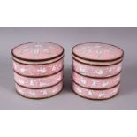 A PAIR OF CHINESE ENAMEL CYLINDRICAL SECTIONAL BOXES, with a pink ground and floral pattern, each