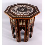 A 19TH CENTURY TURKISH OTTOMAN INLAID MOTHER OF PEARL & EBONY OCTAGONAL TABLE, the top inlaid with