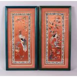 A PAIR OF 20TH CENTURY CHINESE EMBROIDERED PICTURES, embroidered to depict peacock upon branches