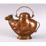 A 19TH CENTURY INDIAN COPPER EWER in the form of a cow, 22cm long.