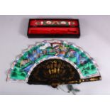 A CHINESE BOXED PAINTED & IVORY SLITHER FAN, with a painted fan with inset ivory slither faces, with