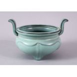 A CHINESE SONG STYLE CELADON POTTERY TWIN HANDLE CENSER, the body with a pale green celadon glaze,